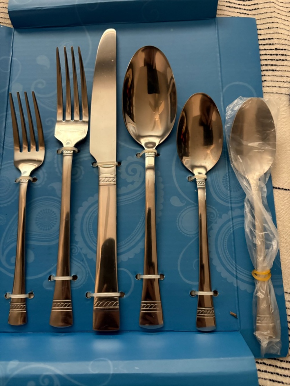 Stainless Steel Flatware—forks, spoons, knives shown here